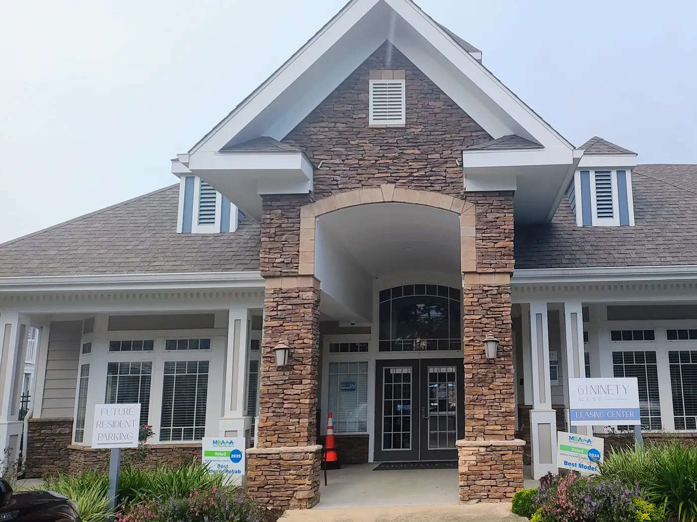 Stone leasing center entrance at 61Ninety West