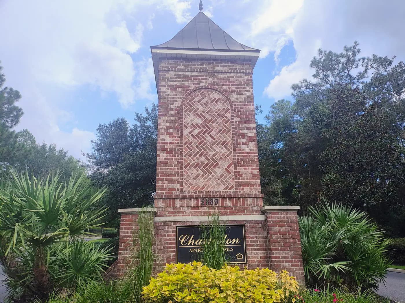 Charleston Apartment Homes brick entrance tower and sign