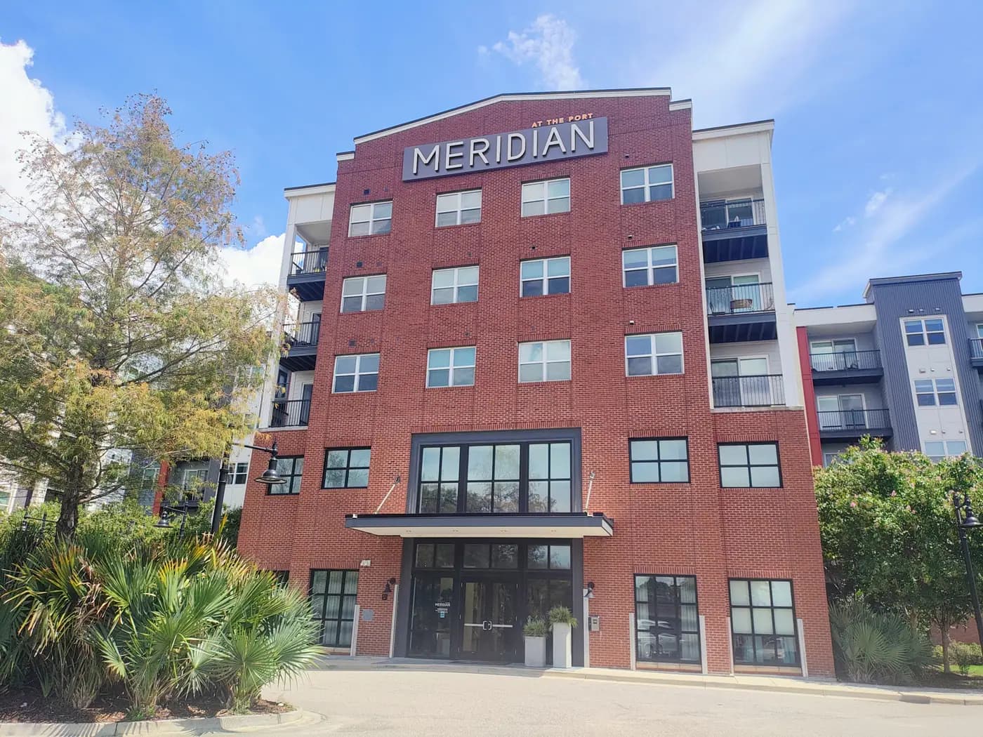 Meridian at the Port signage on the brick facade in downtown Mobile