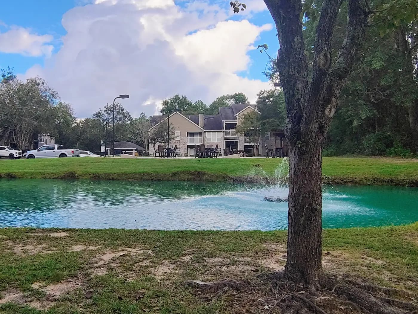 Lake with fountain and residences at Regency Gates in West Mobile