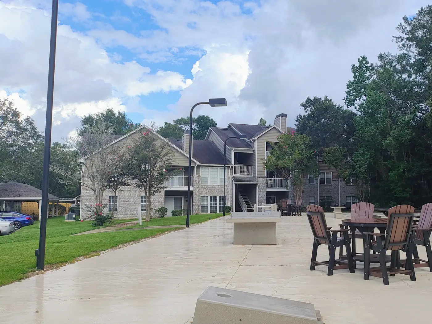 Outdoor grilling and seating area at Regency Gates