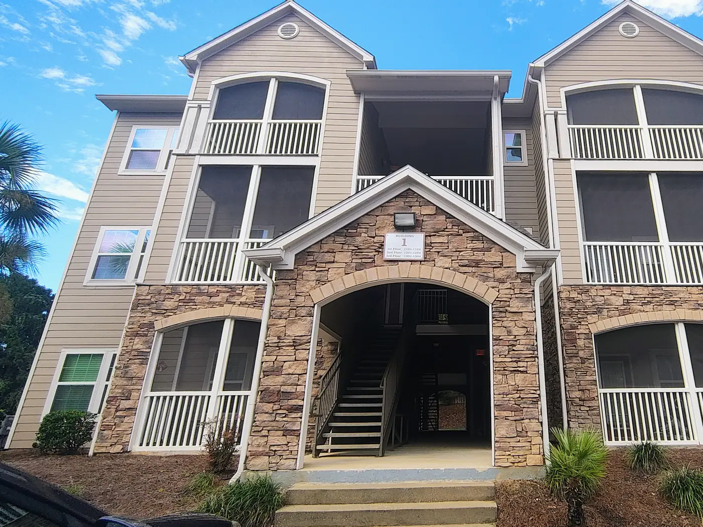 Residences with screened porches at The Crossings at Cottage Hill