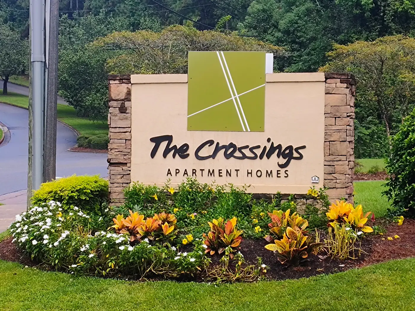 The Crossings Apartment Homes entrance sign on Southland Drive
