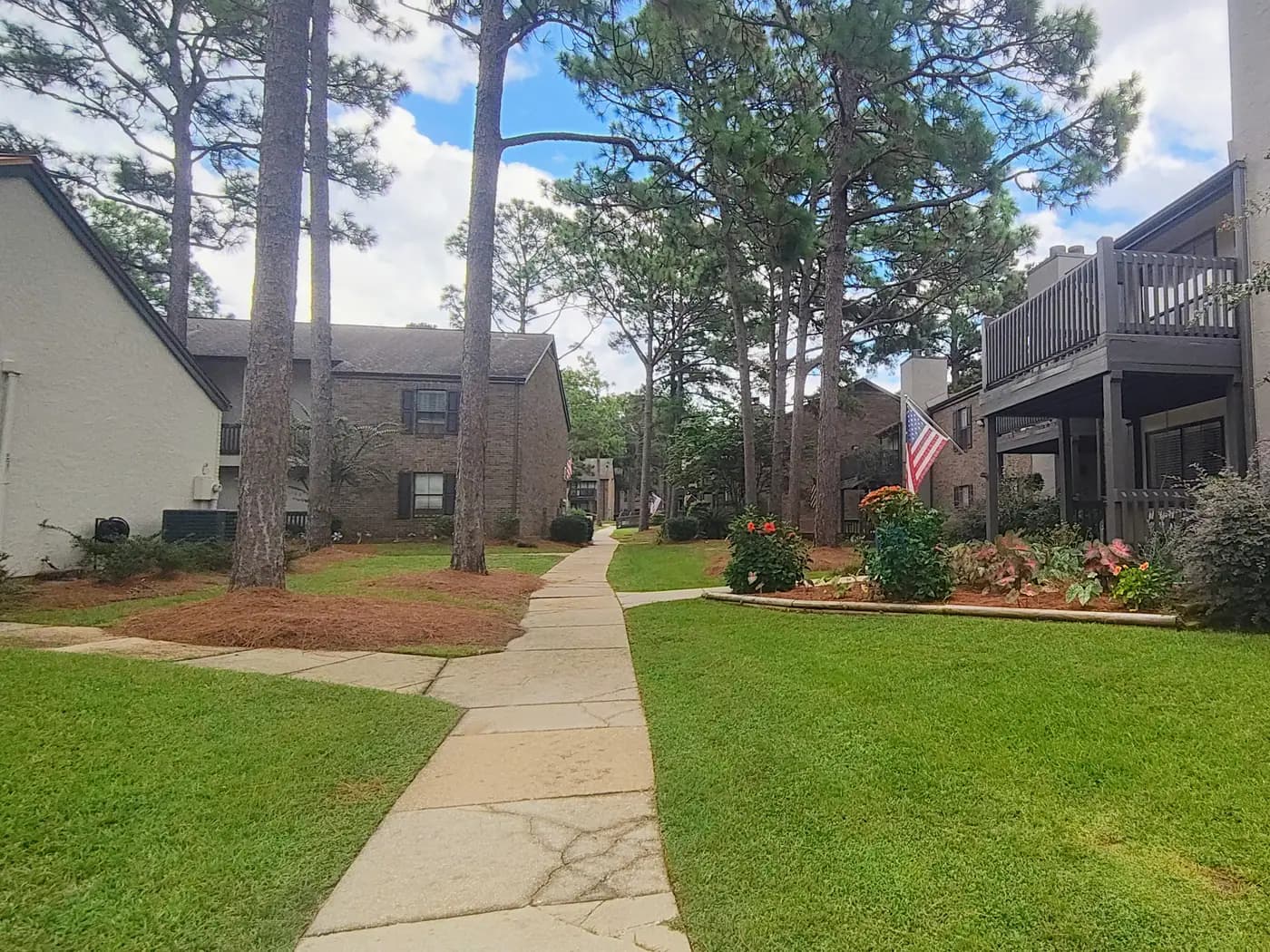 Brick residences and walkway at The Oakley at Hillcrest