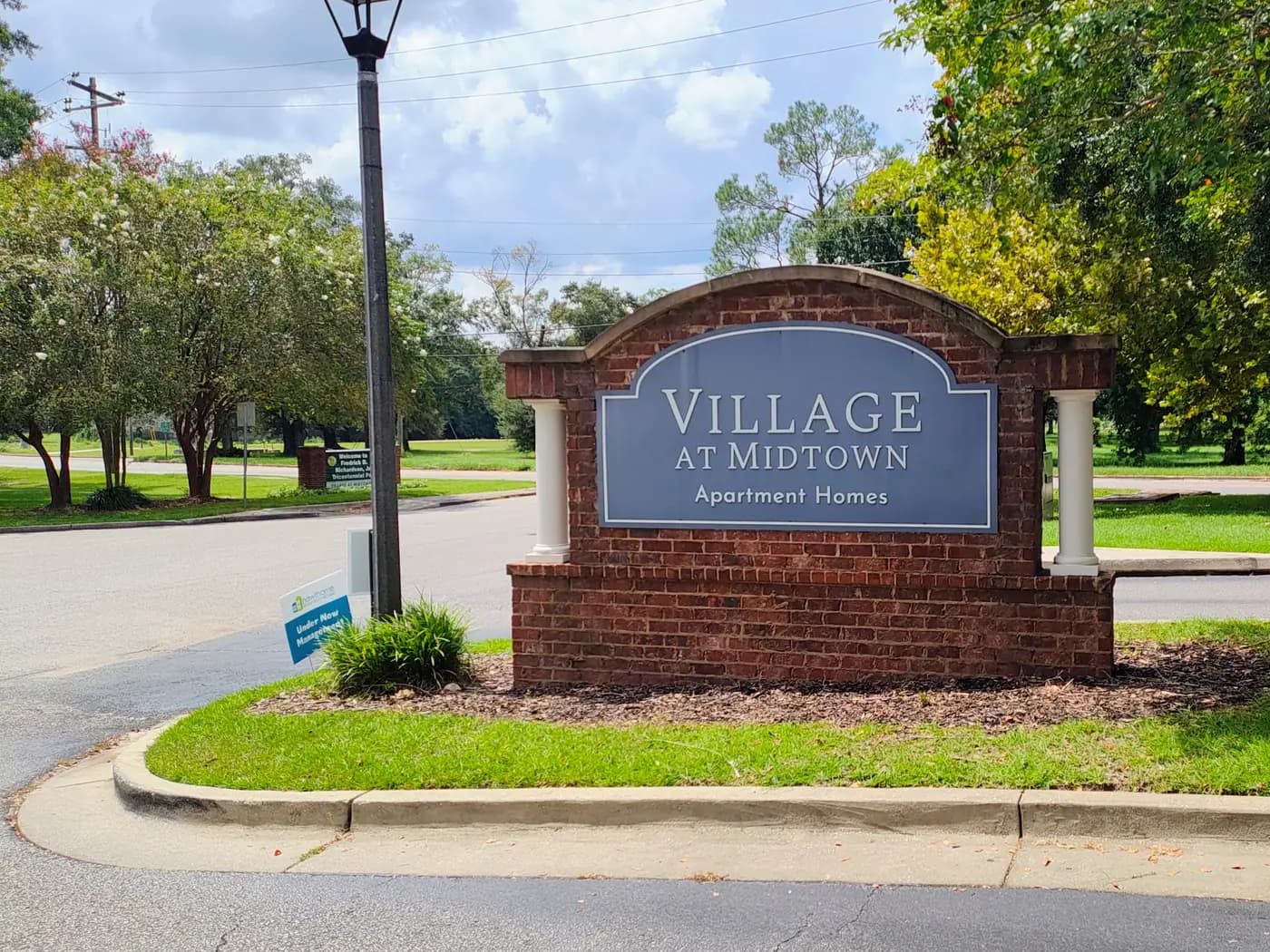 Village at Midtown Apartment Homes entrance sign