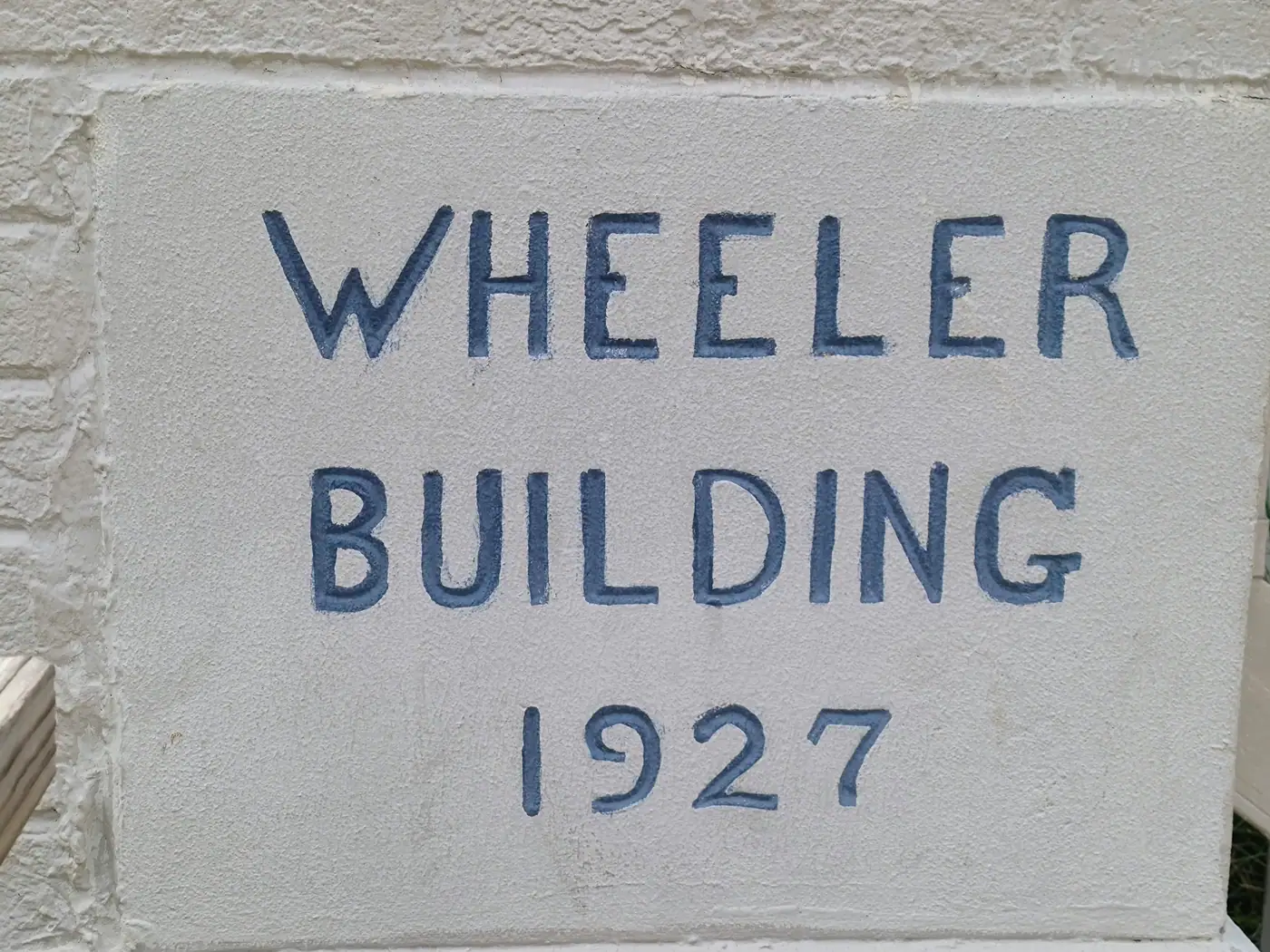 Wheeler Building 1927 carved into the original brick